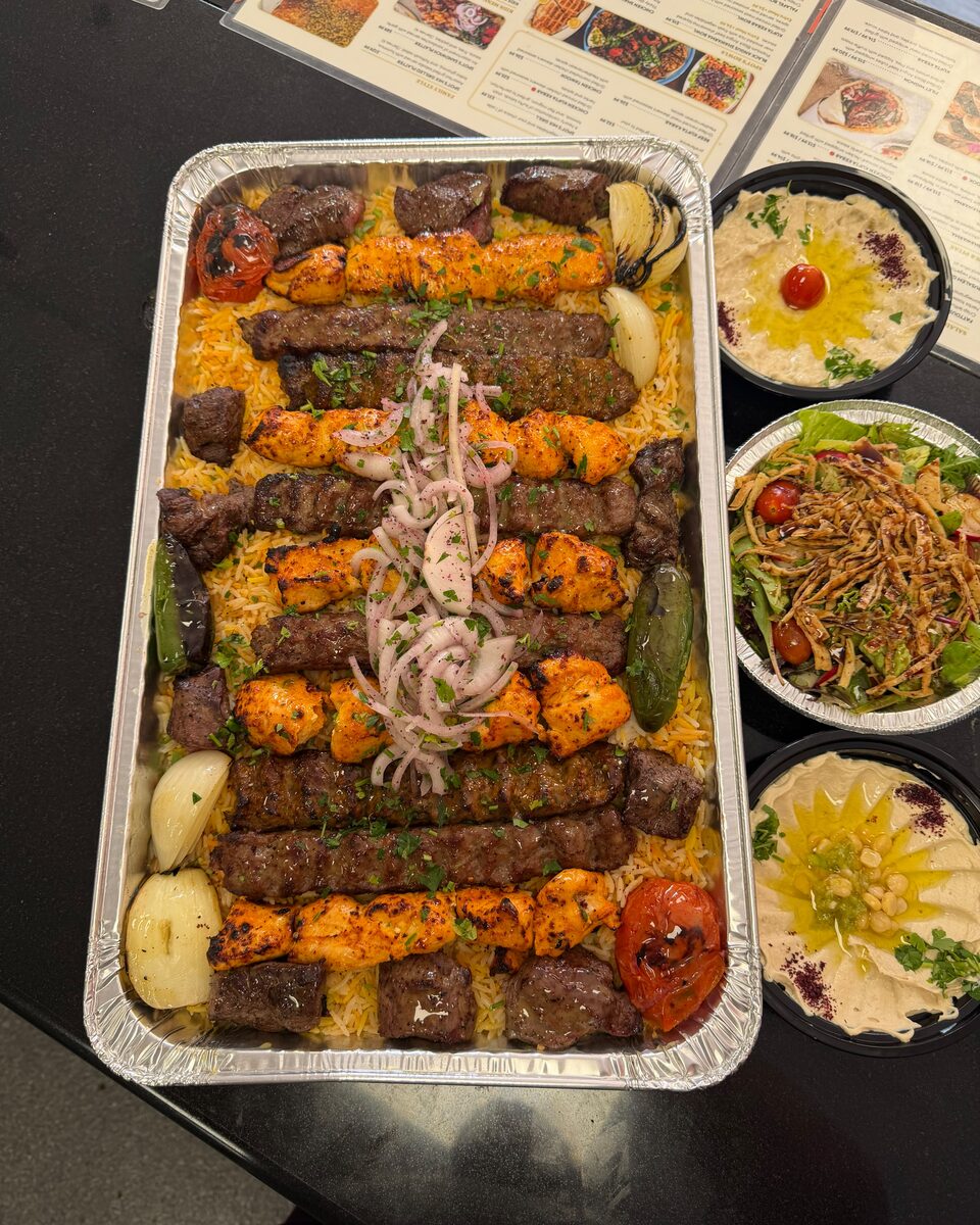 Family-style mixed grill tray from above