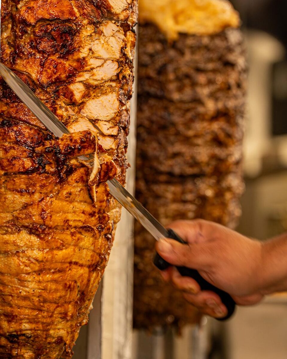 Shawarma being carved from the cone